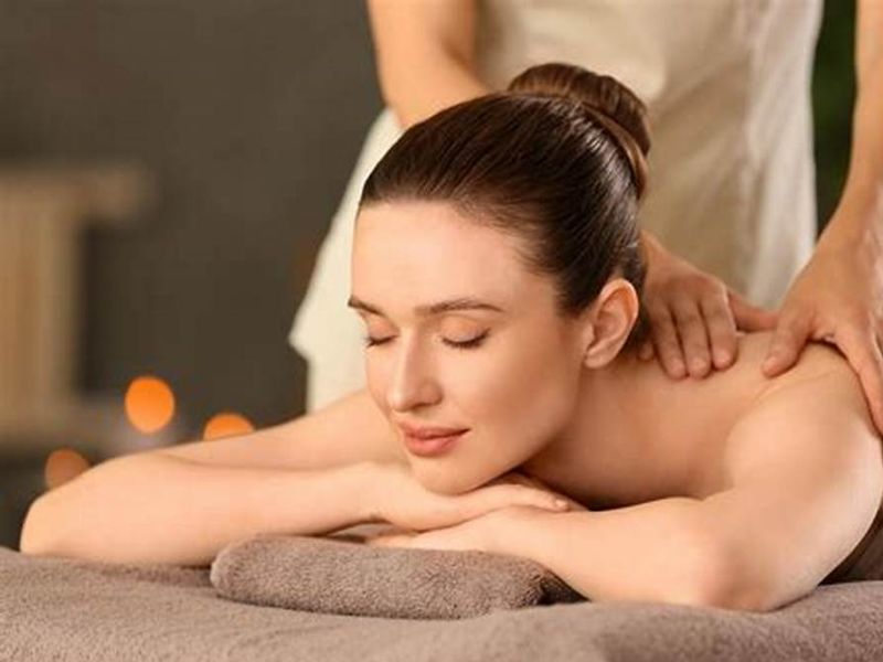 Therapist giving a Swedish massage at a Masteri apartment in Thao Dien